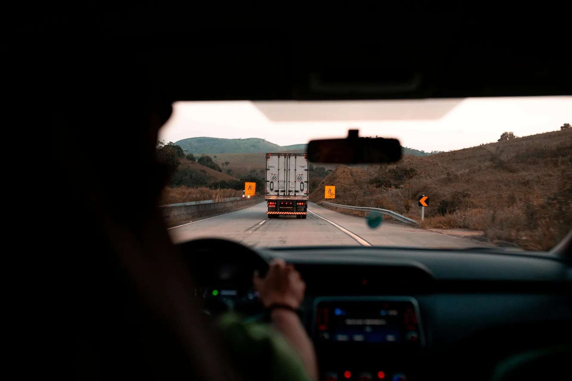 A commercial truck travelling on a highway