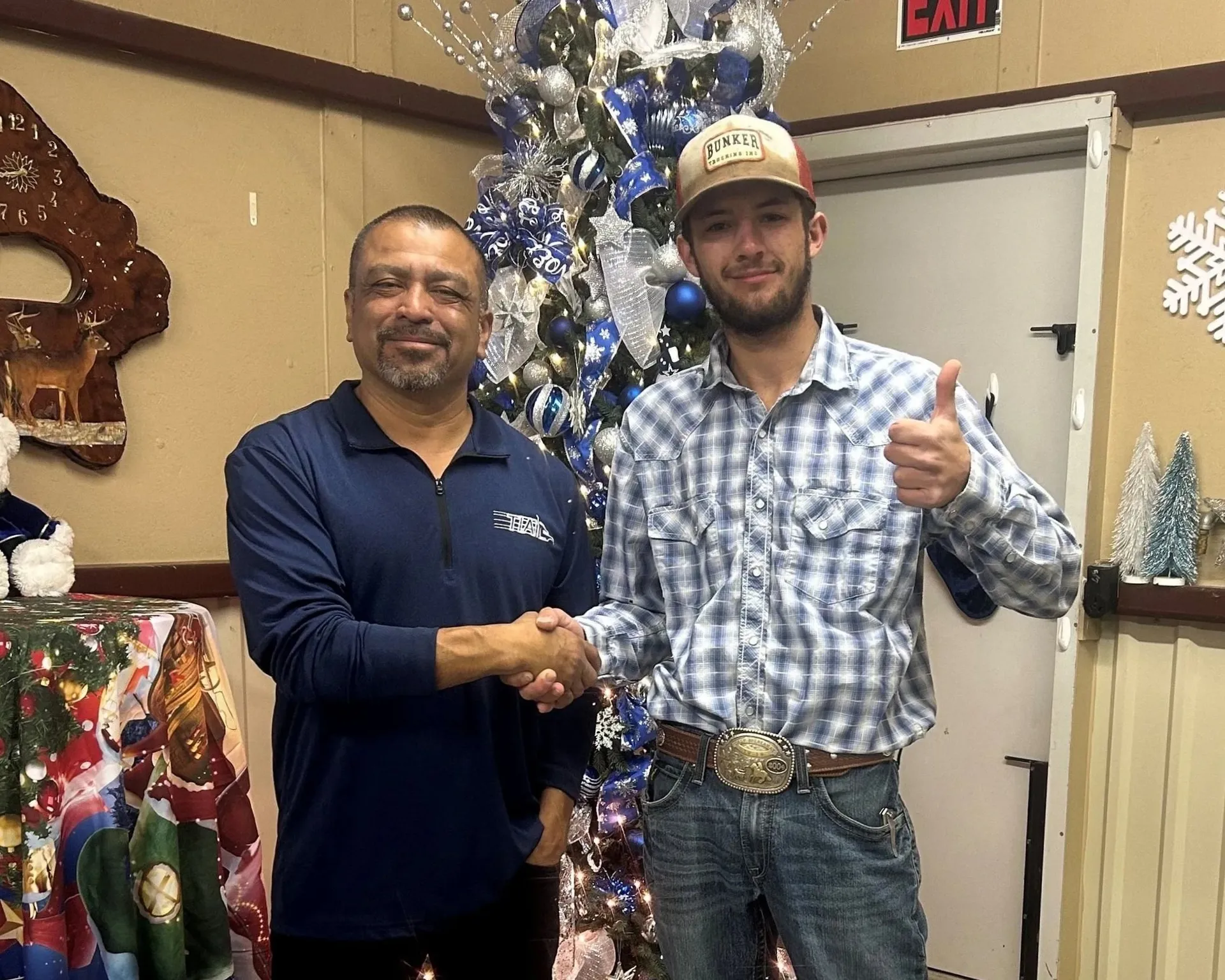 A TIA instructor celebrates with a graduate