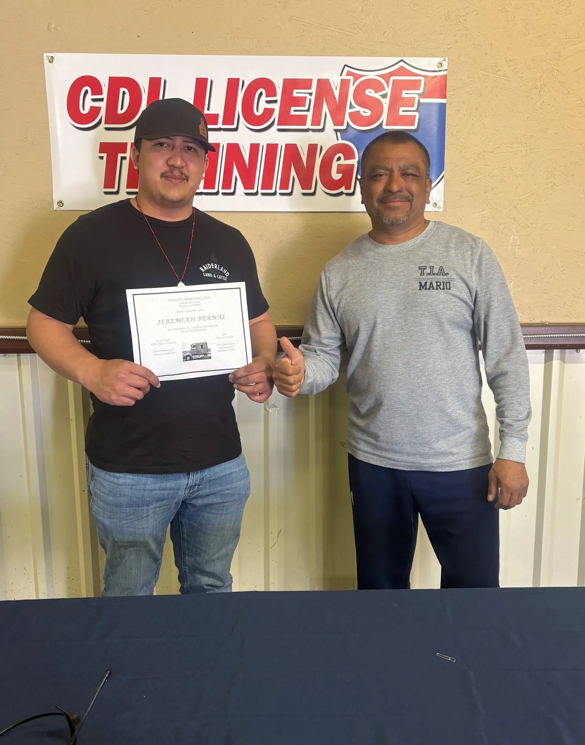 Mario with a TIA CDL Training graduate